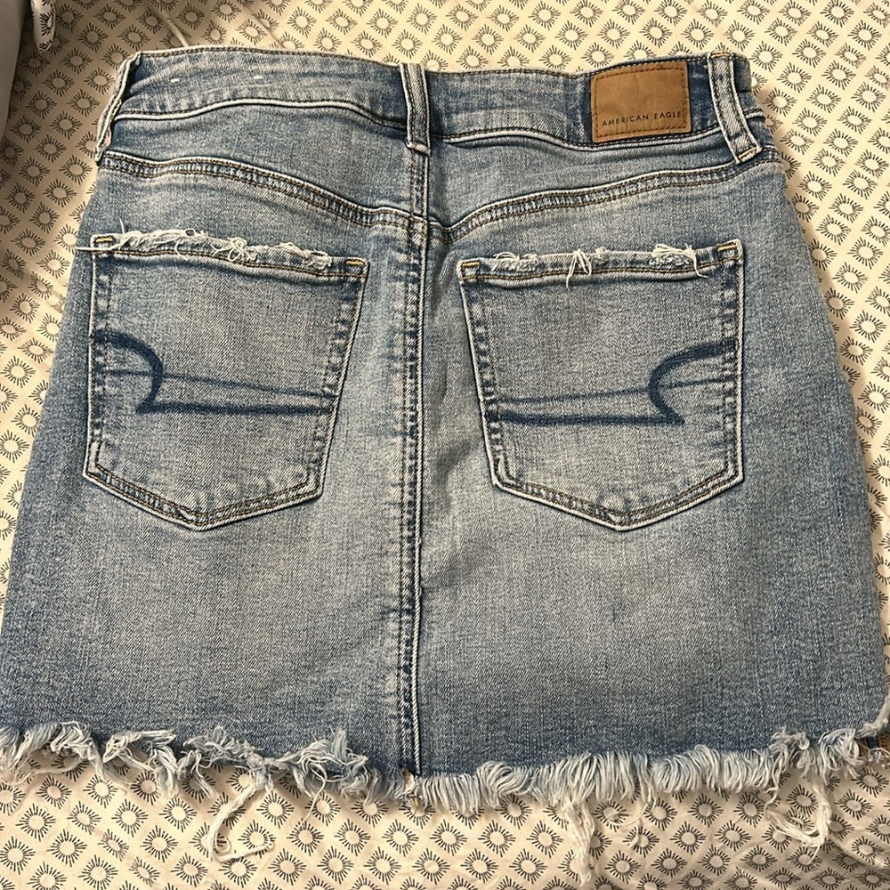 Hi Rise Distressed Jean Mini Skirt American Eagle - Picture 5 of 5